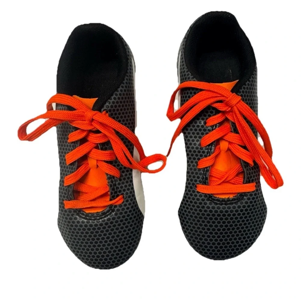 PUMA Kid’s Cleats in orange‎ and black